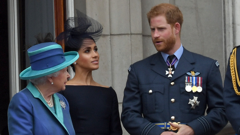 Prince Harry and Meghan Markle with Queen Elizabeth