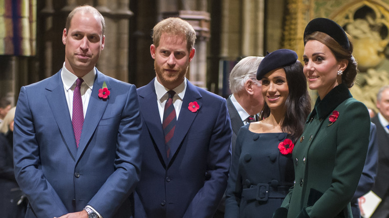 William, Harry, Meghan, and Kate at an event