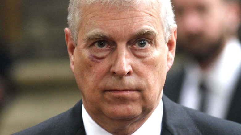 Prince Andrew frowning 