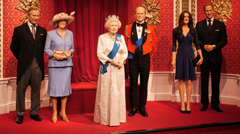 Wax figures of Prince Charles, Camilla Parker-Bowles, Queen Elizabeth II, Prince Philip, Kate Middleton and Prince William 