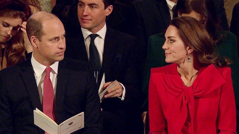 Kate Middleton and Prince William glancing at each other