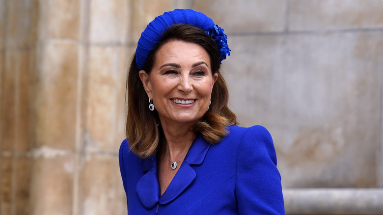 Carole Middleton smiles in blue