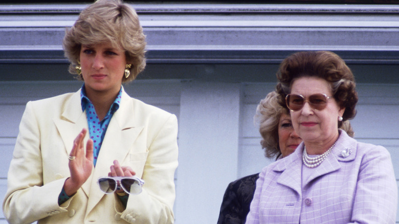 Princess Diana and Queen Elizabeth II clapping