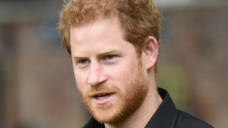 A closeup of Prince Harry's face