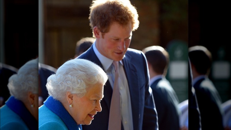 Queen Elizabeth and Prince Harry speaking to each other