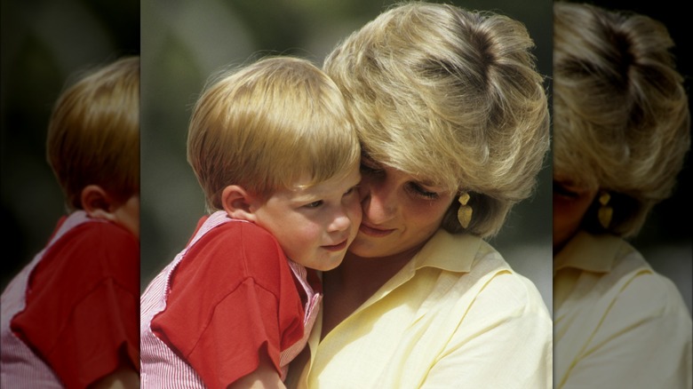 Princess Diana holding Prince Harry