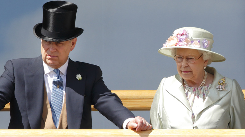 Prince Andrew and Queen Elizabeth II on a balcony