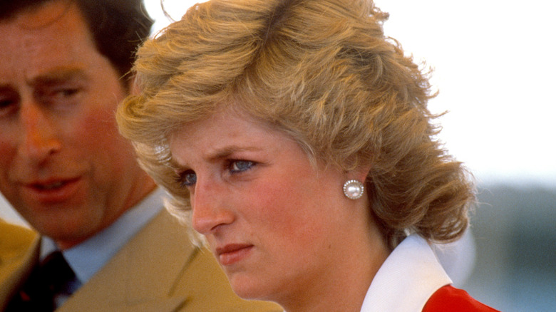 Prince Charles looking at Princess Diana