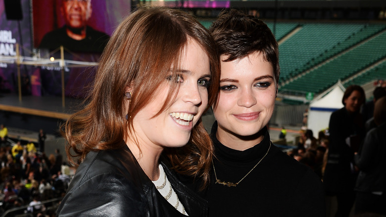 Princess Eugenie and Pixie Geldof at a concert 