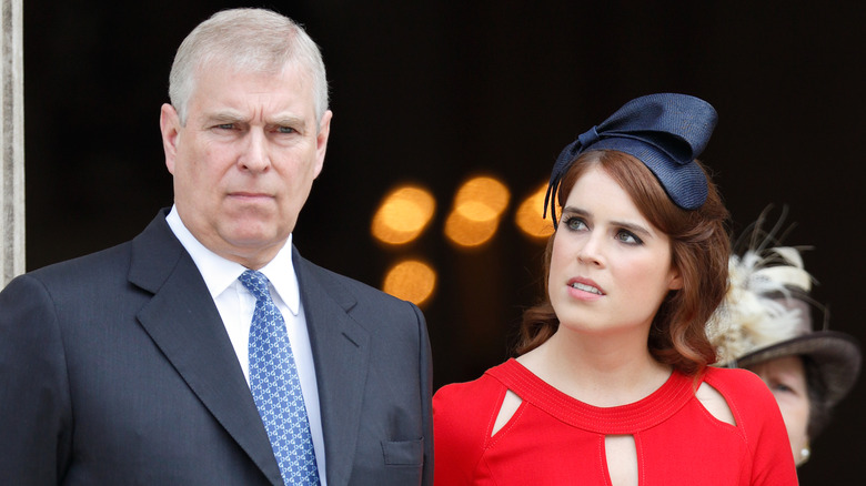 Prince Andrew and Princess Eugenie posing 