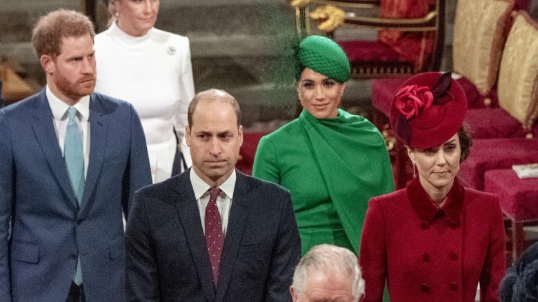 Prince Harry, Prince William, Meghan Markle, and Kate Middleton standing together