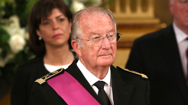 King Albert of Belgium standing, looking off