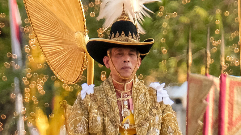 King Vajiralongkorn looking on