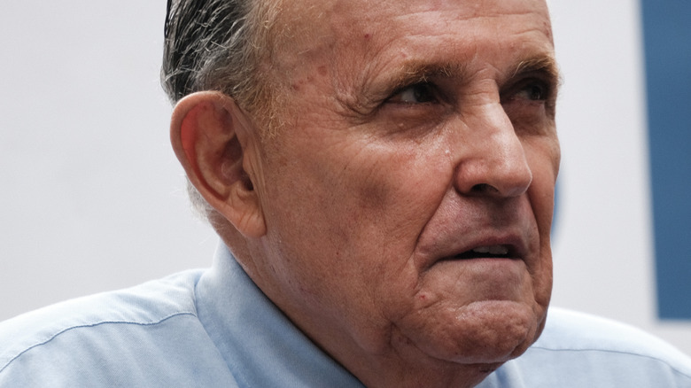 Rudy Giuliani side profile with serious expression