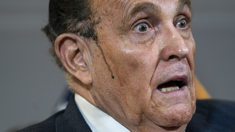 Rudy Giuliani's hair dye running down his face during a press conference 