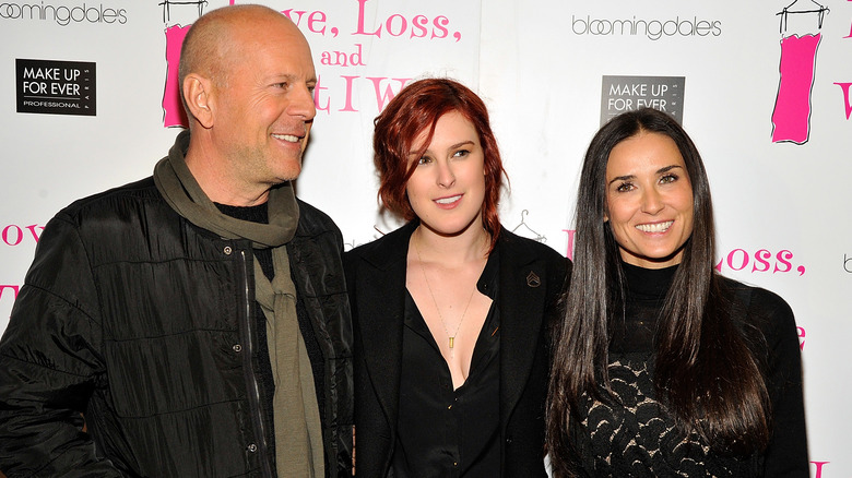 Bruce Willis, Rumer Willis, and Demi Moore smiling