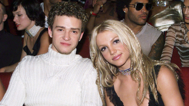 Justin Timberlake posing with Britney Spears