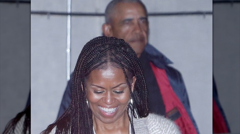 *EXCLUSIVE* - Former First Lady Michelle Obama was all smiles as she exited Mother Wolf with her husband, former President Barack Obama, after enjoying a lovely meal together in L.A. The couple was greeted by waiting admirers and were surrounded by Secret Service agents.