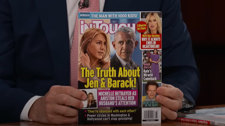 Jimmy Kimmel holding InTouch issue with Jennifer Aniston and Barack Obama on the cover