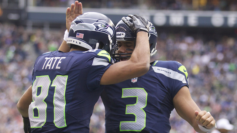 Russell Wilson and Golden Tate during a 2012 football game