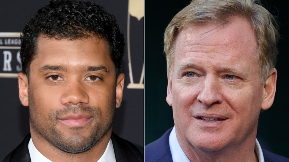 Russell Wilson and Roger Goodell posing