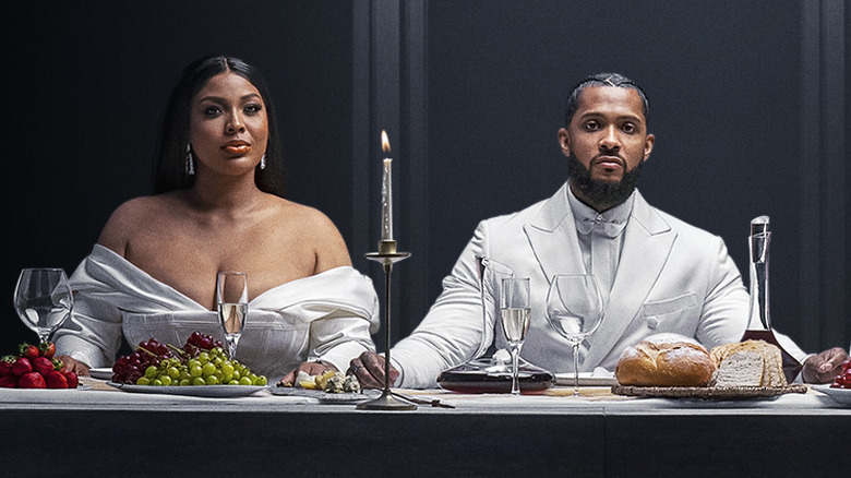 Charmaine Bey and Ryan Henry sitting at table