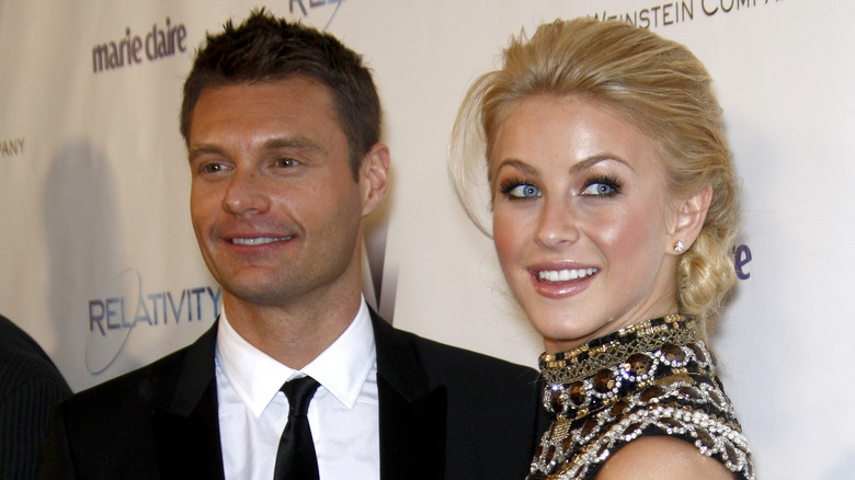 Ryan Seacrest and Julianne Hough posing