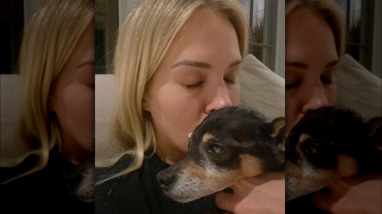 Carrie Underwood kissing pup Ace