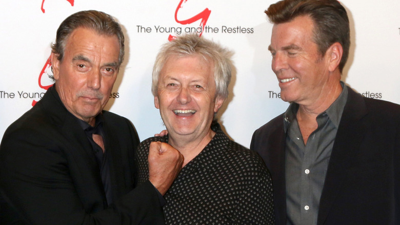 Eric Braeden clenching fist, Mal Young and Peter Bergman laughing