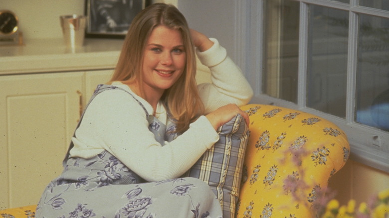 Alison Sweeney on yellow chair