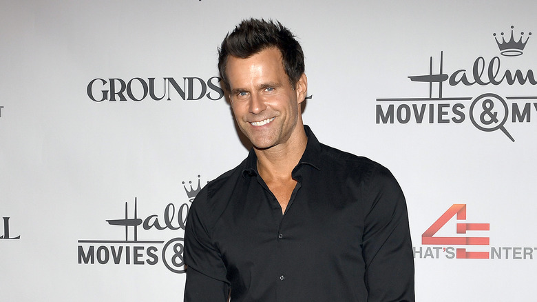 Cameron Mathison black button down shirt