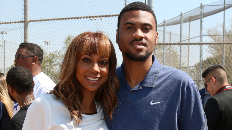 Holly Robinson Peete poses with RJ