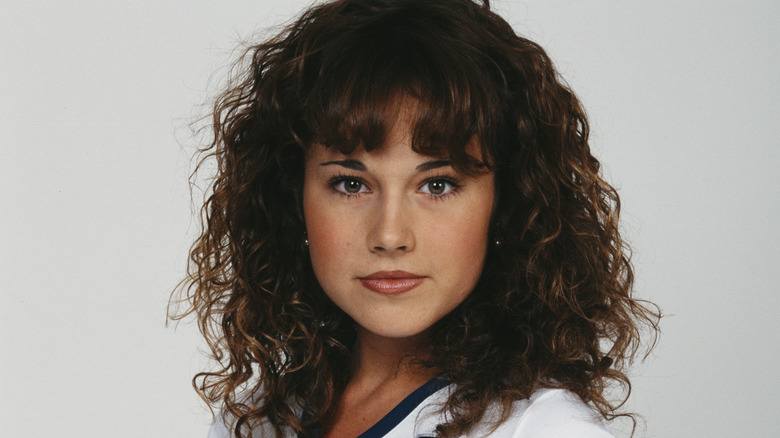 Nikki DeLoach with curly hair