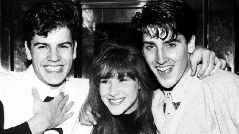 Jordan and Jonathan Knight pose with Tiffany