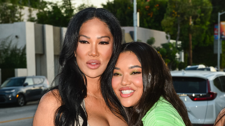 Kimora Lee and Aoki Lee Simmons pose together in 2021