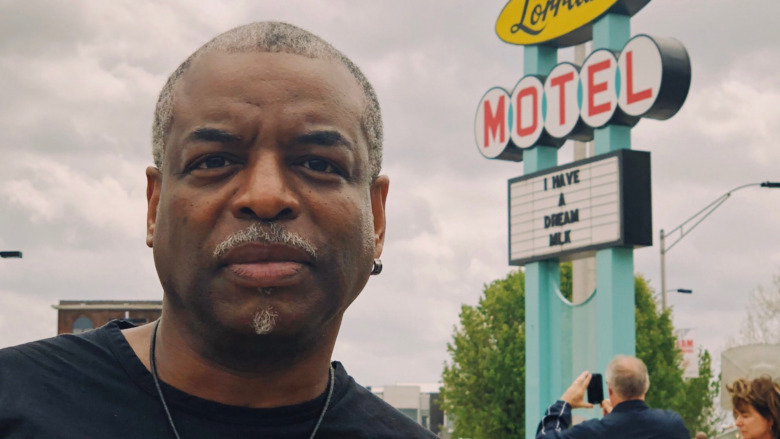 LeVar Burton in front of MLK quote selfie