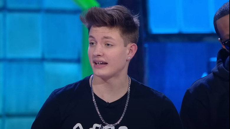 Matt Rife with mouth wearing chain