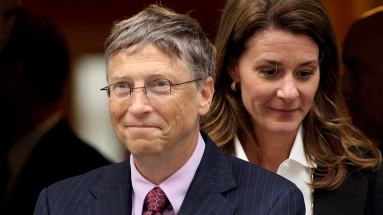 Bill Gates and Melinda Gates standing