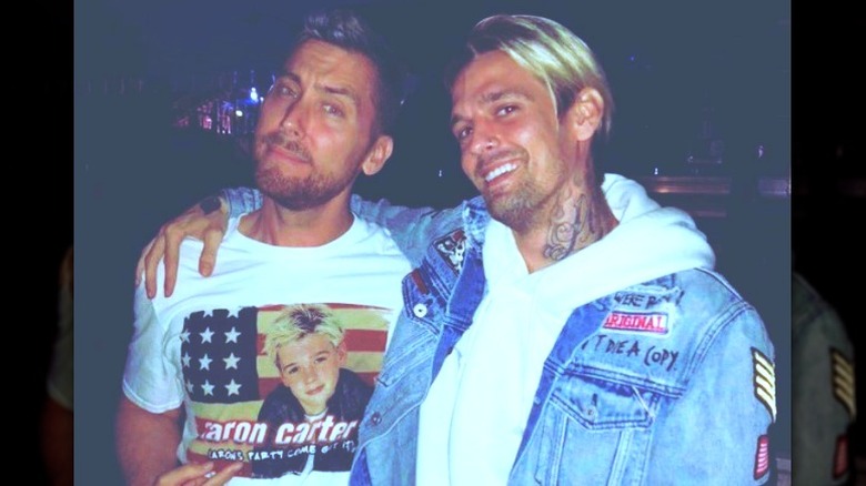 Lance Bass and Aaron Carter posing together