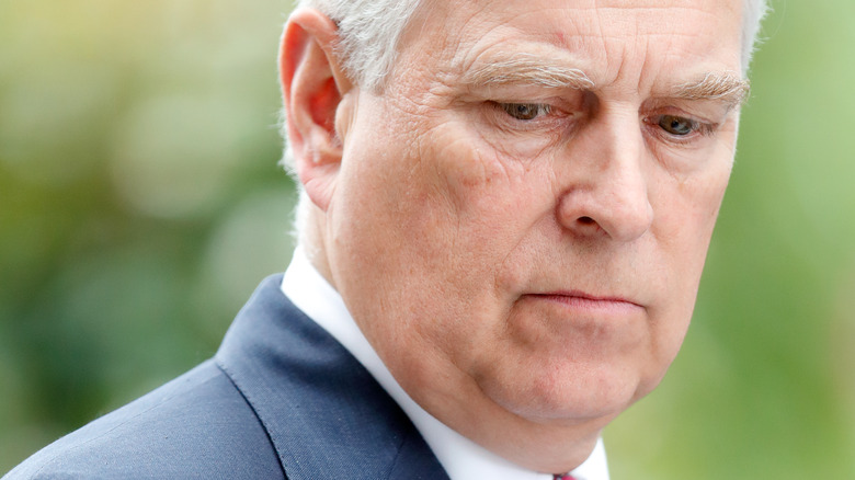 Prince Andrew frowning