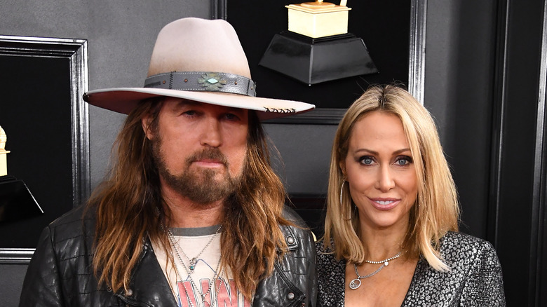 Billy Ray and Trish Cyrus posing