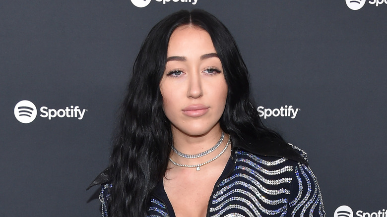 Noah Cyrus posing red carpet