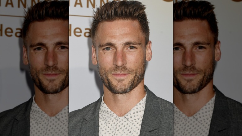 Andrew Walker posing at a Hallmark event