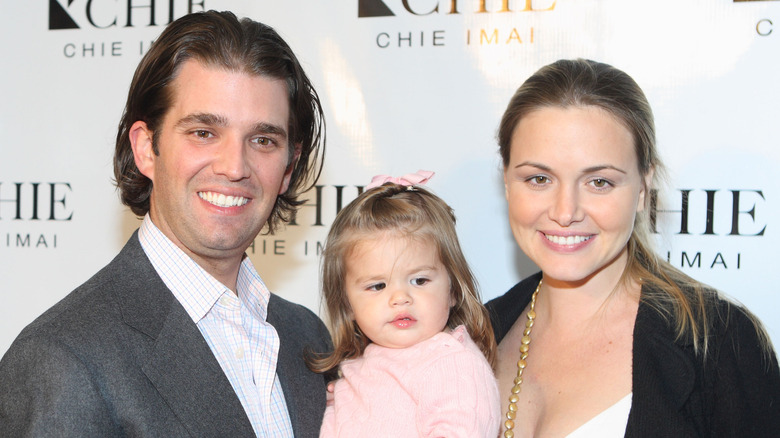 Donald, Kai, Vanessa Trump posing