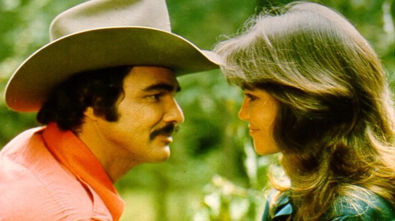 Burt Reynolds and Sally Field posing