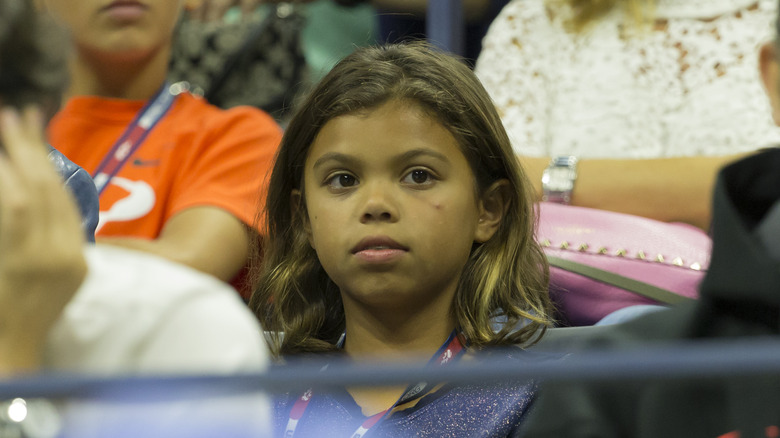 Sam Alexis Woods watching a 2015 tennis match