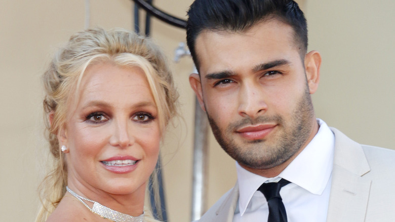 Britney Spears and Sam Asghari pose on the red carpet