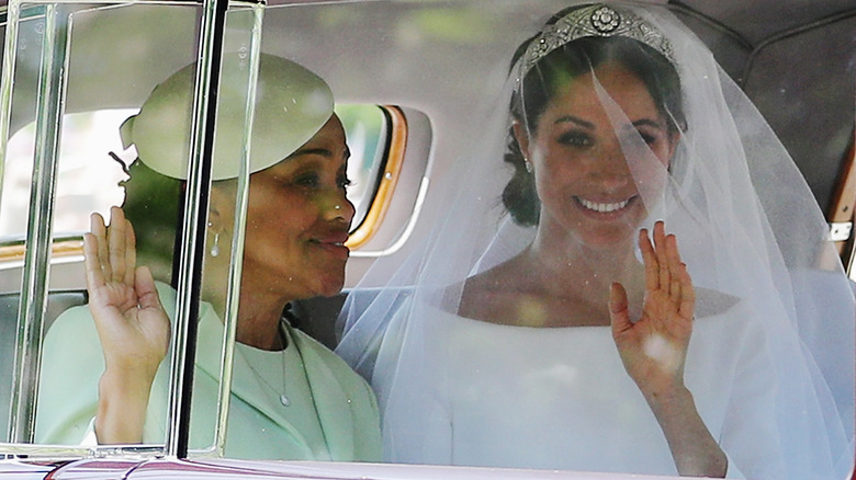 Doria Ragland and Meghan Markle waving