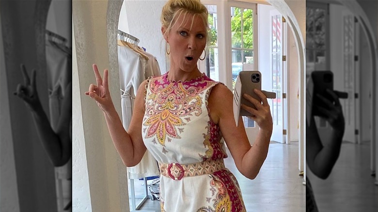 Sandra Lee showing off figure