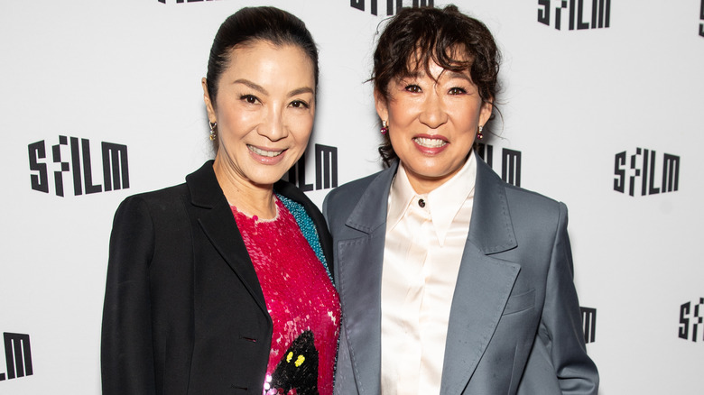Michelle Yeoh posing with Sandra Oh